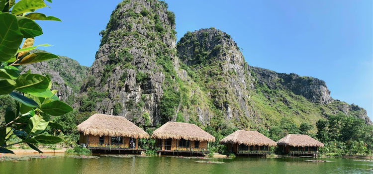 Visit Ninh Binh to admire both long river and majestic mountains