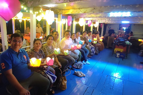 Tourists release lanterns in Hoi An to pray for good luck,